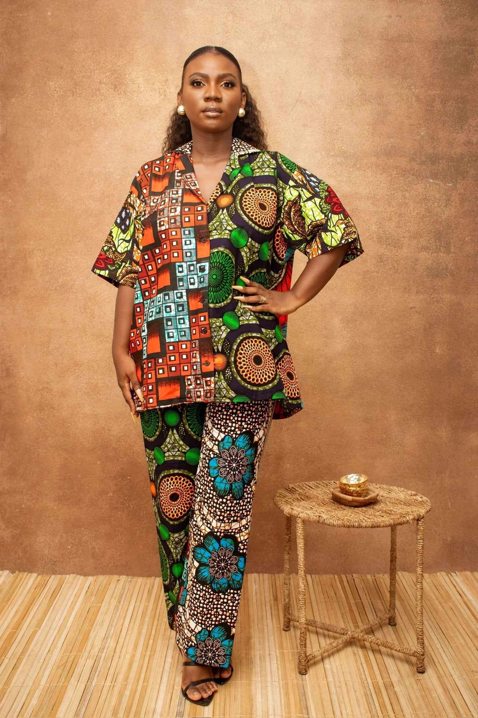 Woman wearing vibrant Ankara print two piece set