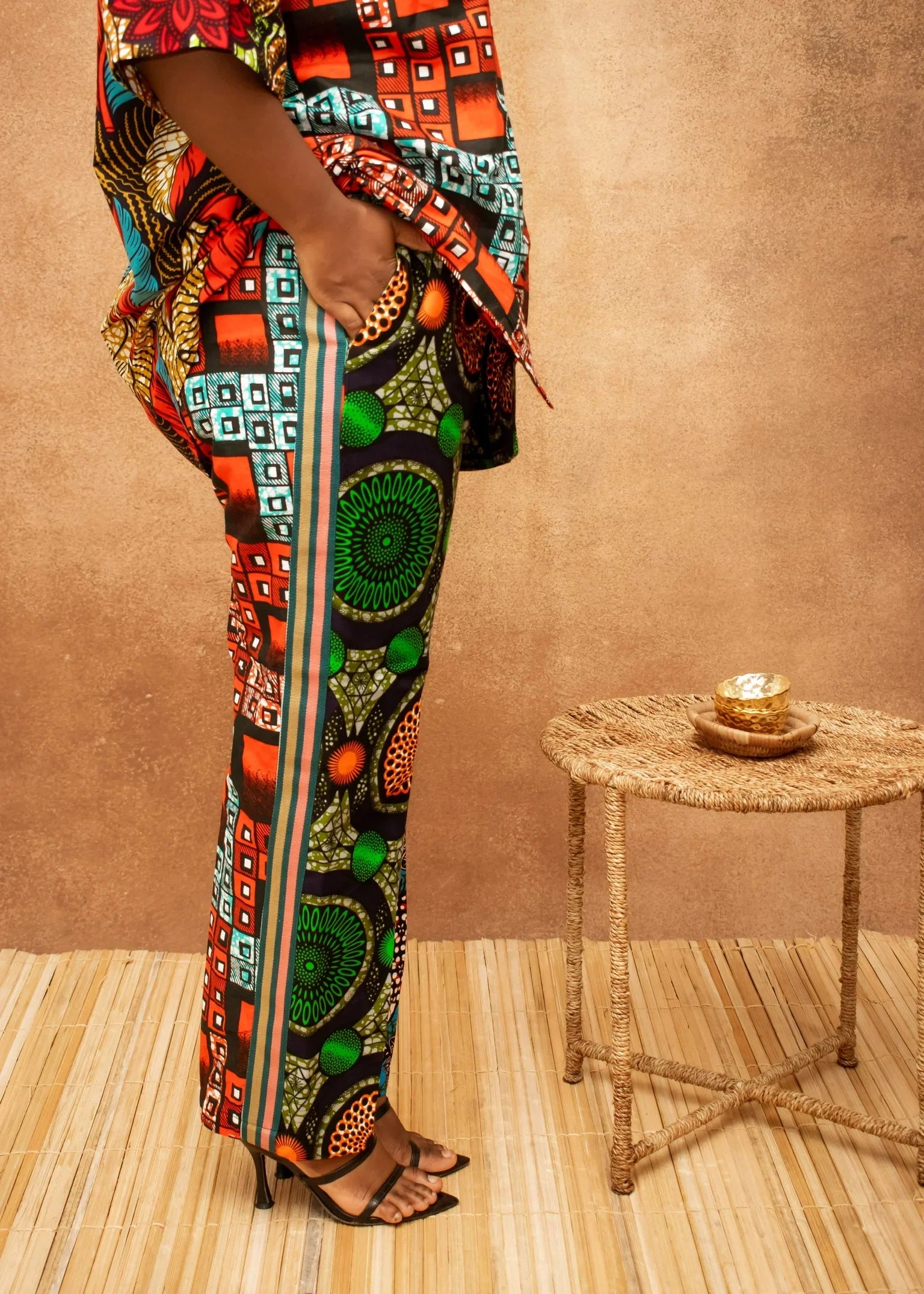 Woman wearing vibrant Ankara print two piece setprint two piece set